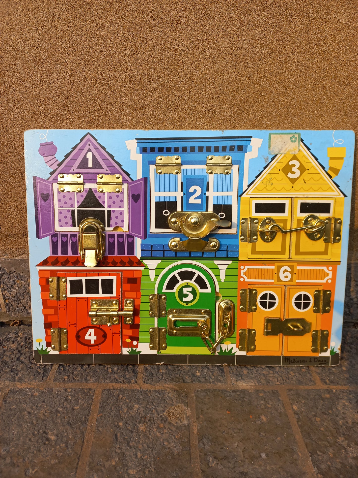 Melissa & Doug latches board